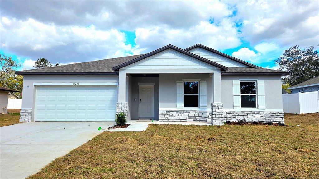 Photo of 11427 Pickford Street, Spring Hill, FL 34609 (MLS # O6323827)