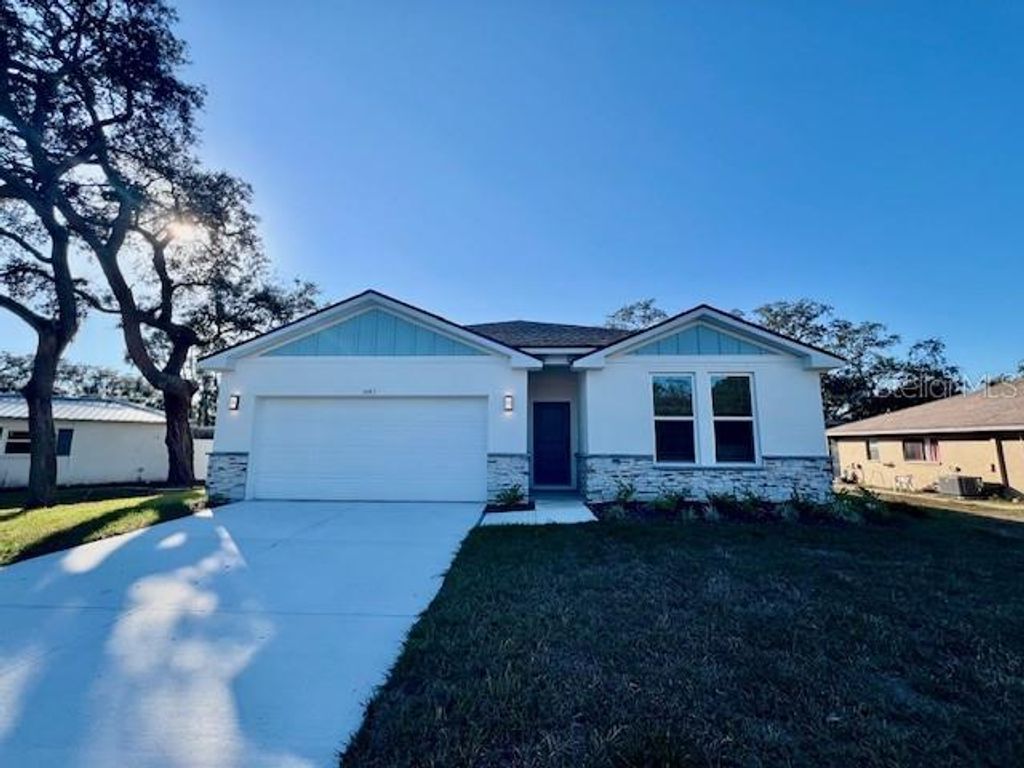 Photo of 1497 Laredo Avenue, Spring Hill, FL 34608 (MLS # W7884561)