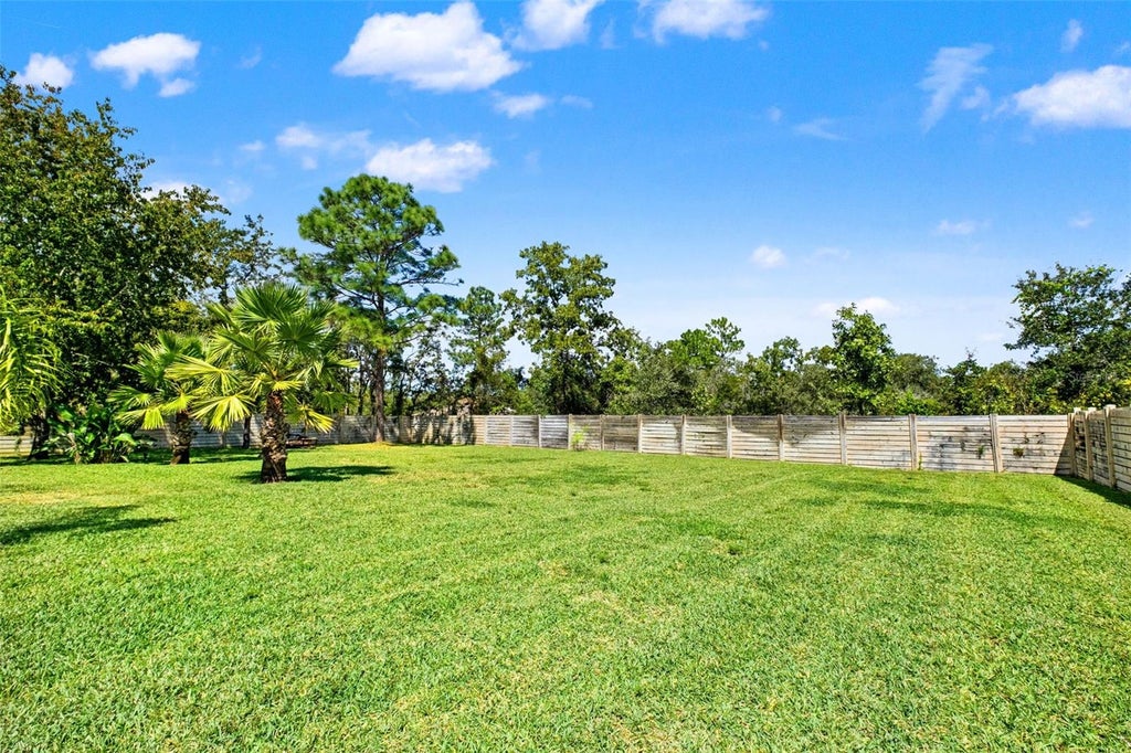 Photo of 13049 Maycrest Avenue, Weeki Wachee, FL 34614 (MLS # TB8554266)