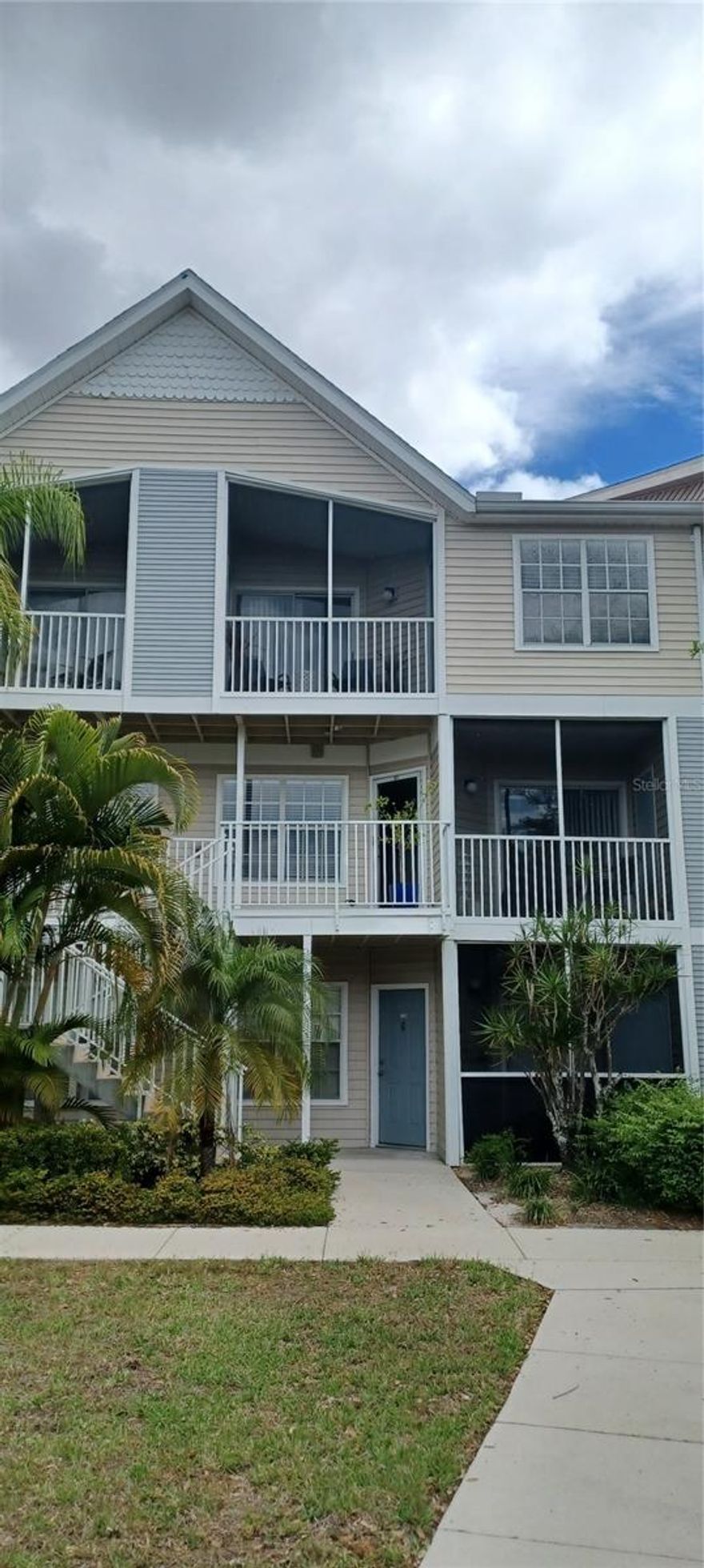 AS PROMISED!  Townhome so close to downtown, but priced considerably less!  This 2BR/2.5BA second floor "Fiji" model condo has newer laminate flooring throughout except for the staris and hallway, and is offered totally turnkey furnished with a couple of exceptions.  Air Conditioner, Water Heater & Washer/Dryer stack unit replaced in 2023.  2 screened lanais  (1 downstairs and 1 upstairs) and 2 separate master suites each with an ensuite bath.  Great room downstairs, in-unit laundry and a powder room. kitchen with breatfast bar, plus a large closet under the stairs which could be used as a small office if needed.  Each lanai has a small storage room too.  Unit overlooks the tennis court (which is mainly used now for pickleball) and is just a short distance to the heated pool and spa, and clubhouse with small fitness center.  Active friendly community with kayak launch available to residents.  Property is currently leased until September 30, 2025, so could be ready for you to spend the next winter season here.  Monthly fee includes cable, internet, water, sewer, trash removal, use of the community recreational facilities, professional management along with exterior maintenance and insurance.  Right across the street is a Publix supermarket for your convenience. Close to Sarasota Memorial Hospital, Marie Selby Botanical Gardens, and just minutes away from St. Armand's Circle shopping and world-famous Siesta Key Public Beach.  Sarasota'a active and cultural downtown is less than a mile away, offering fine dining and the best of the arts with the Sarasota Ballet, Van Wezel Performing Arts Center, the Sarasota Orchestra and much more live entertainment, along with a welcoming night life with something for everyone.  Easy access to Sarasota International Airport.  Perfect for year-round living, rental, or just for seasonal use.  Pet friendly for owners.