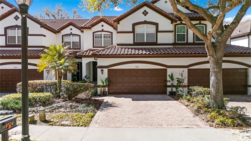 Absolutely stunning LAKEFRONT town home with breathtaking water views in the highly sought-after guard-gated community of Vizcaya, right in the heart of Dr. Phillips! 
Step through the impressive 8-foot entry door and immediately notice the fresh interior paint, elegant crown molding, and magnificent engineered hardwood flooring flowing throughout the main level. Natural light pours into the home, creating a warm and inviting space that truly feels special. The first floor offers two spacious living areas, both showcasing spectacular lake views, the perfect backdrop for relaxing evenings or entertaining friends and family. Step outside onto the expansive deck overlooking the water, an ideal place to gather with loved ones or unwind at the end of the day while enjoying the peaceful lakefront setting and the lifestyle this beautiful home offers.

The chef-inspired kitchen is a true showpiece, featuring real wood cabinetry with upper and under-cabinet lighting, exotic granite countertops with a bullnose finish, stainless steel appliances, and a beautiful breakfast bar that flows seamlessly into the dining nook. Downstairs also offers a generous laundry room with sink and ample cabinet storage. TANKLESS WATER HEATER and NEW HVAC (2024) provide peace of mind and make this home truly move-in ready,  just bring your bags!
Upstairs, durable stain-resistant Berber carpet leads you to two expansive loft areas offering endless possibilities for a home office, media room, or additional living space. The primary suite is a true retreat featuring a beautiful bay window as well as a fabulous balcony where you can even catch fireworks in the distance, especially on holidays! Enjoy a spacious walk-in closet with custom organizer and a private balcony perfect for sipping your morning coffee while taking in peaceful lake views. The en-suite bath features a relaxing jacuzzi tub, walk-in shower, and dual vanities.
Two additional guest bedrooms are generously sized with walk-in closets, newer ceiling fans with lights and share a convenient Jack-and-Jill bathroom.
Vizcaya offers resort-style living with amenities including a community pool, fitness center, gated dog park, and picnic areas. Located walking distance to Restaurant Row and zoned for A-rated schools, with easy access to I-4, Orlando International Airport, and Central Florida’s world-class shopping, dining, and entertainment.
Lakefront end-unit opportunities in Vizcaya are rare, schedule your private tour today and experience it for yourself!