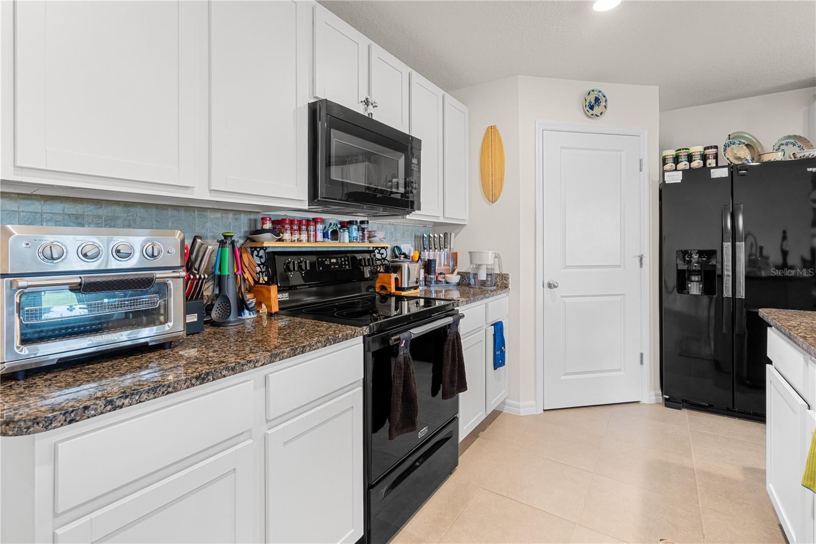 695 NW 243RD TERRACE