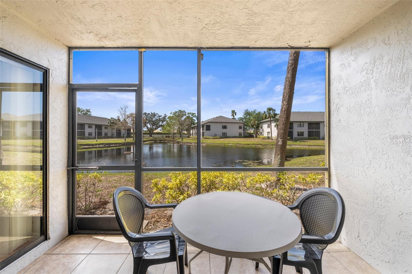 Experience the ease of living or the potential for a smart investment at Shorewalk condos. This ground-floor, end unit, 2 bedroom, 2 bathroom condo provides a serene setting with captivating southwest pond views and breathtaking sunsets. Imagine relaxing in your furnished unit after a day at the nearby Anna Maria Island beaches (easily accessible by bike or public bus). Enjoy tiled flooring throughout the main living areas and spacious bedrooms with wood look flooring. Shorewalk Condos offer on site management if you want to rent your new home with ease. If you are looking for a home in an excellent location next to everything including airports, restaurants, beaches, preserves, zoos and sporting events then this Shorewalk condo is a must-see!