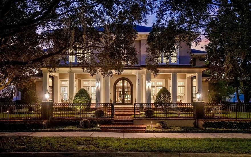 One or more photo(s) has been virtually staged. Experience luxury living in this exquisite four-bedroom lake view home custom built by Derrick Builders on an oversized corner lot on one of the most sought after addresses in Baldwin Park. Traditionally designed with modern touches spanning over 6,000 square feet of living space with an exceptional blend of comfort and elegance ideal for intimate and large gatherings. Updates include new roof in 2024, new HVACs in 2023 and 2024, carpeting, spa heater, kitchen light fixtures, Sonos system, and 4K Epson projector. As you enter into the foyer, you are greeted with formal living and dining areas extensive millwork opening into the family room showcasing the picturesque views of the saltwater pool, private courtyard and meticulous landscaping. The chef-inspired kitchen features Busby cabinetry, six-burner gas range and griddle, three ovens, island, two dishwashers, built-in Miele coffee maker, hidden walk-in pantry, breakfast nook, wet bar, ice maker and more. Just off the kitchen is a mudroom, built-in workspace and additional cabinetry flowing into the functional laundry room. Relax in the primary suite on the first floor with the comforts of a wet bar, beverage cooler, jetted tub, walk in shower and grand custom closet. On the second floor you'll find extra flex space, three generously sized bedrooms, two are en suite, with custom walk-in closets. In addition, a home office wrapped in the finest designed paneling with built-ins, tons of storage, a humidor, wet bar, beverage cooler and a gas fireplace. Unwind in the private backyard designed for relaxation and entertaining, take a dip in the beautiful saltwater pool or spa while enjoying the outdoor amenities of a summer kitchen featuring a Viking gas grill or take a steam shower in the outdoor pool bath. Above the double garage entertain in the movie theater with eight stadium seating acoustic reclining chairs and the convenience of a powder bath, kitchenette complete with a mini-fridge, dishwasher and microwave. Tinker in the air-conditioned single garage upgraded with epoxy flooring, a built-in work bench and an air compressor. Enjoy nearness to downtown Baldwin Park providing access to popular dining options, local grocery, fitness studios, boutiques and more. Live actively utilizing the various recreational paths, green spaces and the 2.5-mile trail around gorgeous Lake Baldwin. Community amenities include three pools, gyms, playgrounds and clubhouses. Great public schools all accessible within the neighborhood, 15 minutes to downtown, 20 minutes to MCO and 10 minutes to Park Avenue. Video Tour https://www.tourdrop.com/dtour/386060/Video-MLS and Zillow Tour & Floorplan: https://www.tourdrop.com/dtour/386060/Zillow-3D-MLS