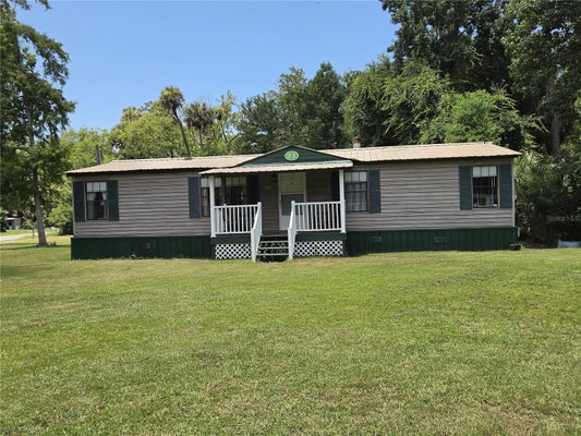 56314 BLUE CREEK RD, ASTOR, FL 32102 - Image 2920f7d55bbdafa37a7d5ec07c670ef8/575772284