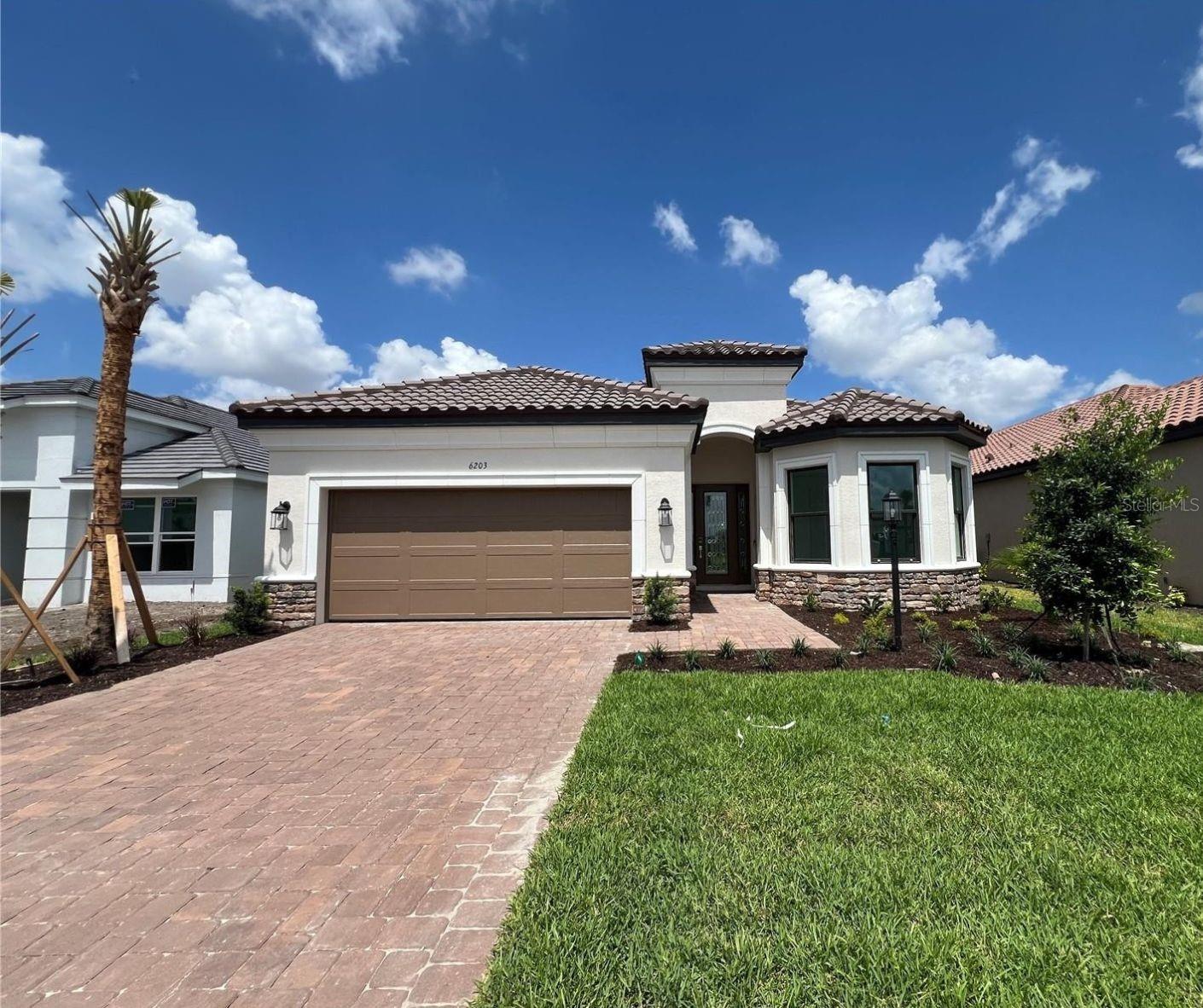 HUGE PRICE REDUCTION! **Welcome to Your Dream Home at 6203 Grandview Hill Court!**. $275,000 in owner upgrades!!!! Every Upgrade in this home was designed to be the future owner's forever home! Discover the perfect blend of comfort and elegance in this stunning 3-bedroom + Den, 3-bathroom, 2-car garage home in the desirable Esplanade at the Heights. As you step inside, you'll fall in love with the endless designer porcelain tile flooring and the spacious, open floor plan filled with bright, natural light. The Huge Island is perfect for both entertaining and everyday living. The contemporary, spacious kitchen features stainless steel Whirlpool appliances, a gas cooktop, a custom backsplash, ample counter space, and a charming breakfast nook, making it a true delight for any chef. HOA provides regular maintenance, Trimming of the grass and garden!
Relax in the generous master suite, featuring an extra-large walk-in closet and an en-suite bathroom with dual vanities, additional storage, and a luxurious soaking tub. Two additional spacious and cozy bedrooms provide ample space for family, guests, and a home office in the bright and airy den room.
All modern-day requirements have been considered in the layout of this home.
* All TV connections have been placed correctly on all walls.
* The living room has conveniently placed floor electric outlets.
* The kitchen has the thought-out convenience of soft-close, pull-out drawers.
Step outside to your private, manicured waterfront backyard, ideal for enjoying Florida's beautiful weather and celebrating the Florida lifestyle
This Esplanade community has fantastic amenities, including a pool, clubhouse, tennis, activities director, and the convenient nearby walking and exercise trails of Mount Tumelo just across from the Clubhouse!
Conveniently located near shopping, dining, and top-rated schools, this home is a must-see! Don’t miss your chance to make it your own—schedule a showing today!