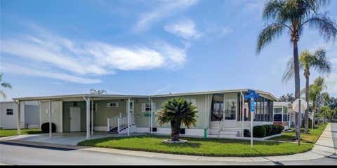 Photo of 225 Dixie Lane, Tarpon Springs, FL 34689 (MLS # TB8528582)