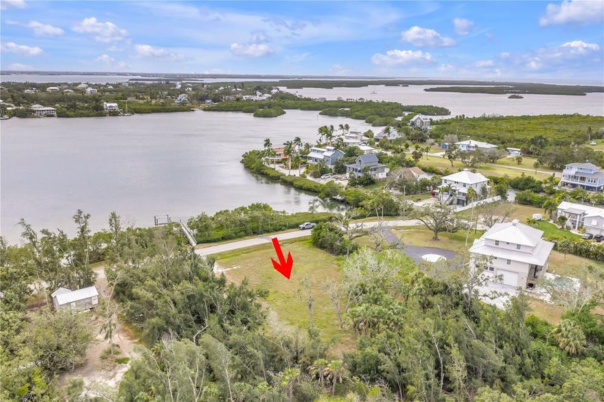 Waterfront homesite on ½-acre bayfront lot with a NEW DOCK and 12,000 lb lift. Located on Terra Ceia Island in the exclusive Bayside Subdivision. Enjoy beautiful, unobstructed views of Tillet’s Bay from this exceptional waterfront lot, with easy access to the Gulf of Mexico. 
The lot has been improved with fill dirt and is certified buildable.
Perfectly located near Bradenton, Sarasota, St. Petersburg, Tampa, and Lakewood Ranch, Bayside offers convenient access to city amenities while maintaining the privacy and Old Florida charm of this one-of-a-kind community.
County water is available and the Bayside Community includes irrigation water provided through the community well via the homeowners association.
Terra Ceia is a distinctive waterfront, golf-cart-friendly community rich in history and natural beauty, featuring historic sites, nine miles of nearby hiking trails (Emerson Point Preserve), with boat and kayak launches—offering access to some of the best inshore fishing in the world.
For a nominal annual fee, Terra Ceia Village Improvement Association (VIA) membership provides access to the community center and Seabreeze Park, which includes a boat ramp, fishing dock, pickleball courts and picnic facilities.
Build your custom dream home and live in the tropical laid back "Florida Lifestyle" of Terra Ceia Island.