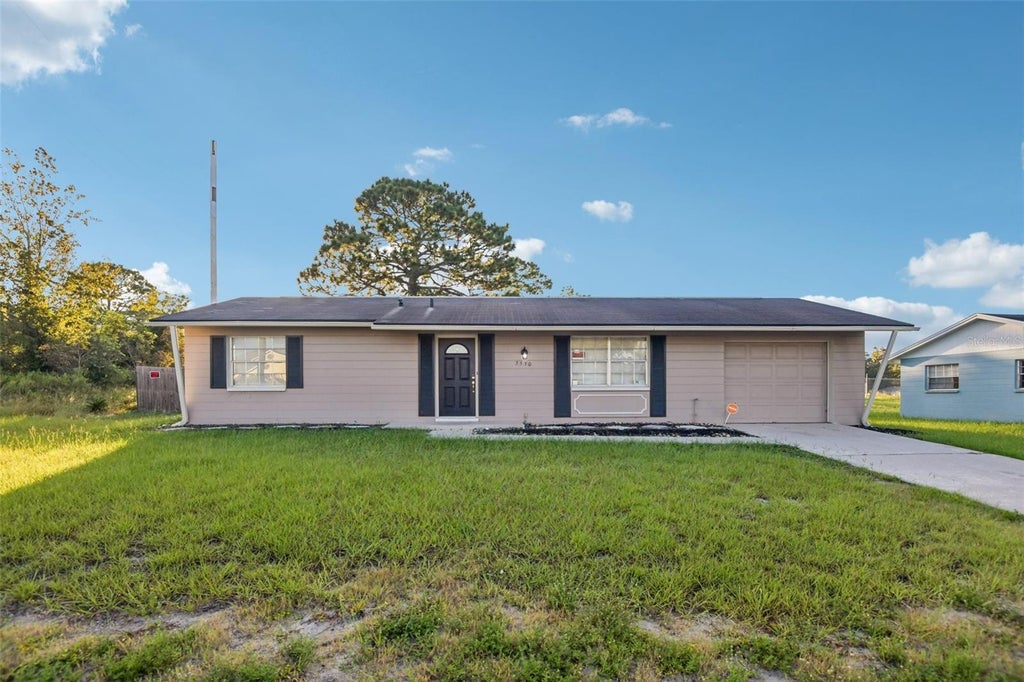 Photo of 5550 Mariner Boulevard, Spring Hill, FL 34609 (MLS # TB8554436)