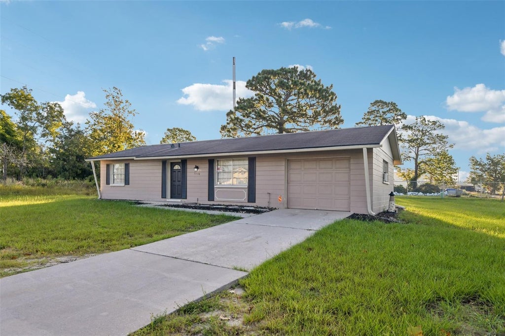 Photo of 5550 Mariner Boulevard, Spring Hill, FL 34609 (MLS # TB8554436)