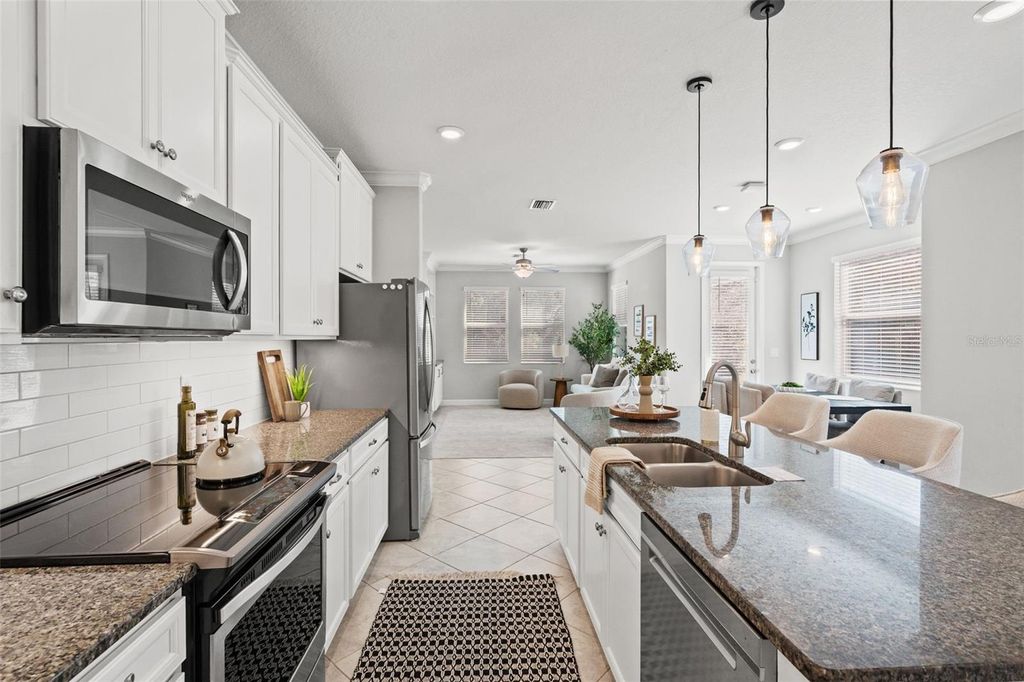 Photo of 6830 Citrus Creek Lane, Tampa, FL 33625 (MLS # TB8471163)