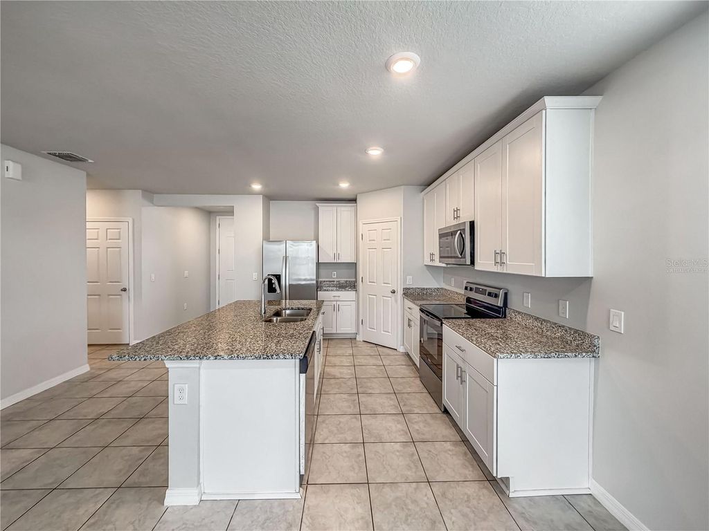 Photo of 868 Teton Street, Haines City, FL 33844 (MLS # O6409207)