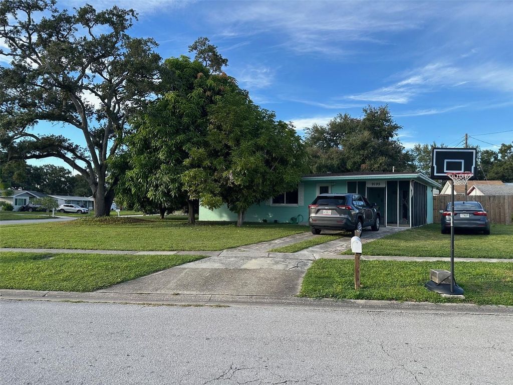 Photo of 9195 Enchantment Drive, Largo, FL 33773 (MLS # TB8429007)