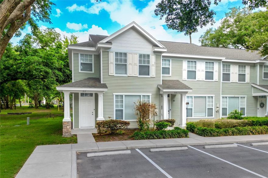 Come home to where comfort meets affordability!  Charming 2BR/1.5ba end unit offers peace and quiet with lots of green space!  Brand new carpeting upstairs with beautiful laminate flooring downstairs.  Open and airy spaces with large bedrooms equipped with walk-in closets and lots of natural light!  Kitchen includes wood cabinetry, built-in pantry and all appliances - including a trash compactor!  Plus a downstairs half bath for guests!  There's also a screened lanai for those perfect Florida nights and that first cup of morning Joe!  Just steps away from the community pool...this unit has it all!  There is also a small dog run at the back of the community.  This community is conveniently located to shopping and dining with a low monthly HOA fee making it convenient and affordable!  Come take a look today!