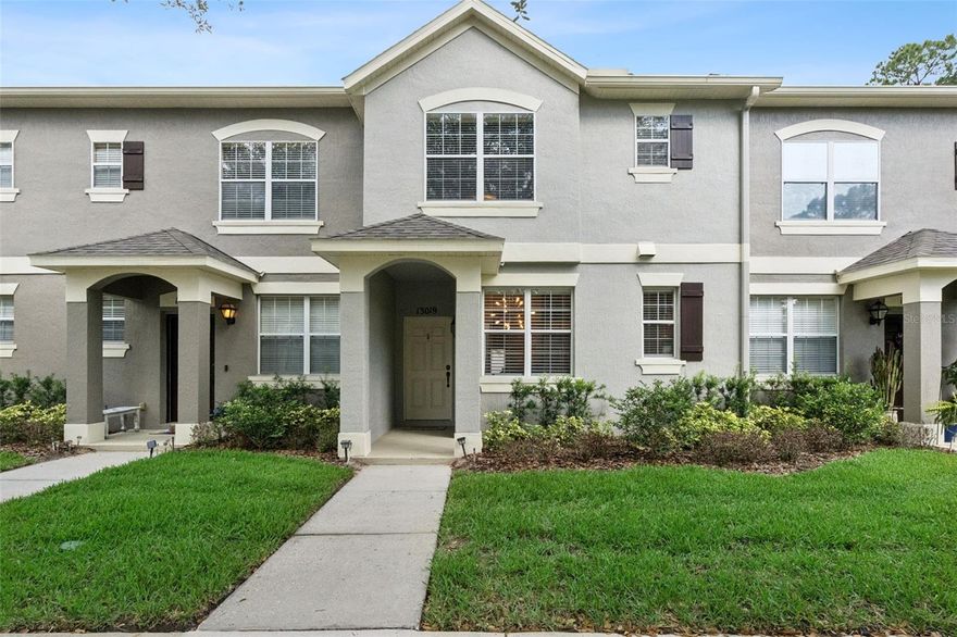 Tucked away in the peaceful Lake Reams Townhome community, this charming home offers the perfect balance of excitement and relaxation — just minutes from Disney, shopping, dining, and top-rated schools, yet surrounded by the quiet comfort you’ll love coming home to after a day at the parks. Located at the end of a cul-de-sac with no rear neighbors and serene conservation views, this townhome feels like a private retreat in the heart of it all.  Inside, you’ll find a bright eat-in kitchen featuring granite countertops and stainless steel appliances, opening into a spacious living and dining area designed for easy everyday living and entertaining. Outside you’ll find your private courtyard — the ideal spot for morning coffee before heading to Disney or winding down in the evening.  The courtyard also leads to the detached 2-car garage for added convenience.  Upstairs, the spacious primary suite creates a relaxing escape with double sinks, granite countertops, a garden tub, separate shower, and walk-in closet. The second bedroom includes its own private bathroom as well.  The laundry closet is upstairs which makes laundry a breeze and the washer and dryer convey!  Additional updates and features include a new AC (2025), newer roof (2022), downstairs half bath, ceiling fans, and generous storage throughout. The HOA takes care of lawn maintenance, exterior pest control, and provides access to the community pool — giving you more time to enjoy everything Central Florida has to offer while still coming home to peace and privacy.