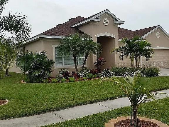Ready to move in. Concrete block with stucco, 2-story (bonus office). New granite kitchen. New hurricane (140mph) shingles. New exterior paint. Corner lot 2 blocks from community pool. 3 bedrooms (12 X 11) with 9 ft ceilings. Tile and/or wood throughout.