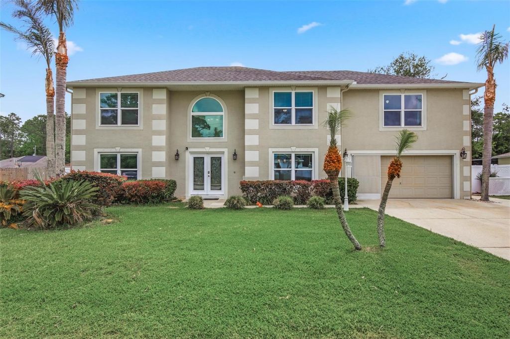 Photo of 13 Slowdrift, Palm Coast, FL 32164 (MLS # FC318178)
