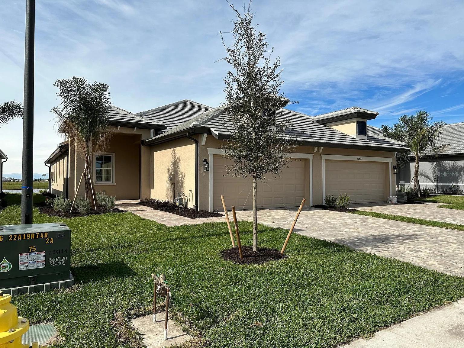 Live pondside in Sweetwater at Lakewood Ranch! This modern 3-bed, 2-bath villa offers resort-style amenities, a bright open floor plan, a modern kitchen with elegant stone countertops, and a private screened lanai overlooking a peaceful pond. Enjoy exclusive access to community pools, fitness centers, and more. With schools and shoping just minutes away, this villa is the perfect place to call home!