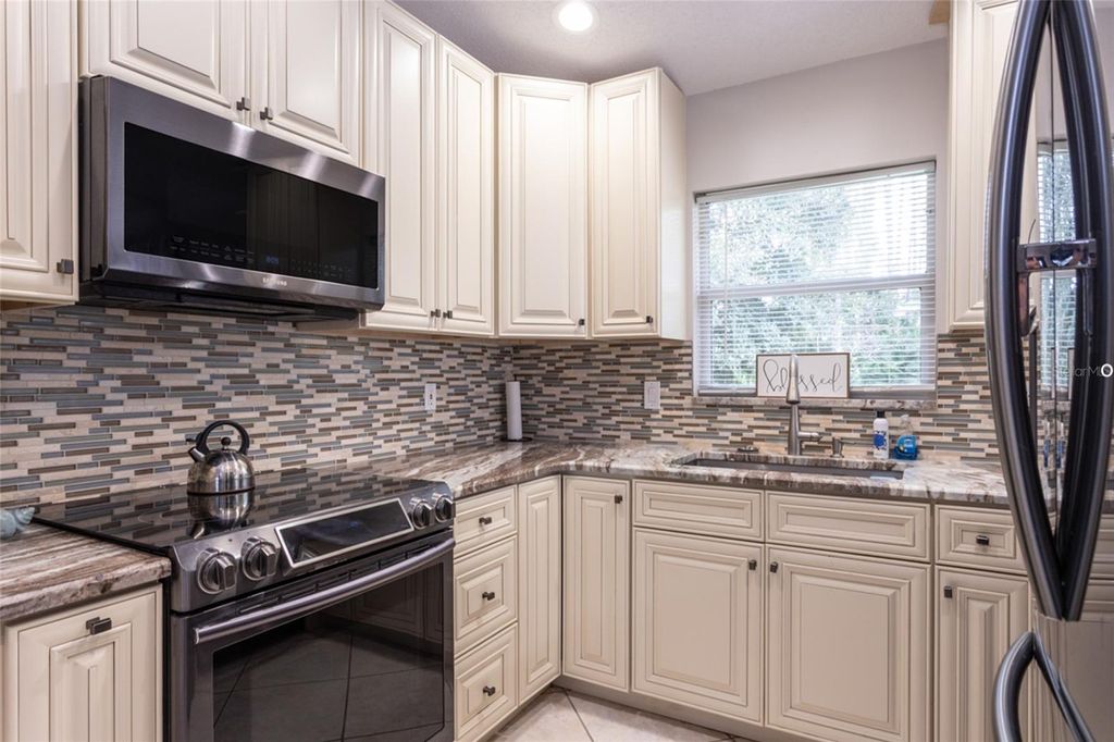 Photo of 28 Beacon Mill Lane, Palm Coast, FL 32137 (MLS # FC313088)