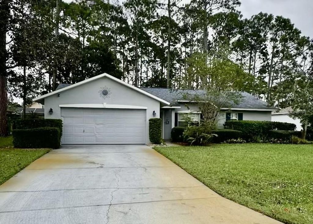 Photo of 28 Beacon Mill Lane, Palm Coast, FL 32137 (MLS # FC313088)
