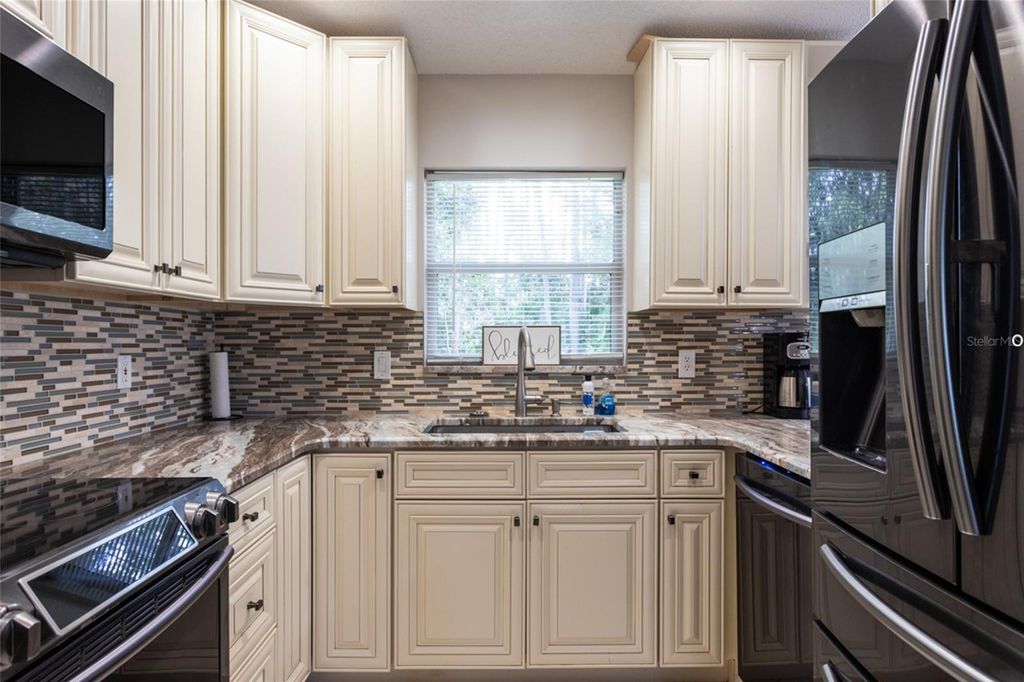 Photo of 28 Beacon Mill Lane, Palm Coast, FL 32137 (MLS # FC313088)