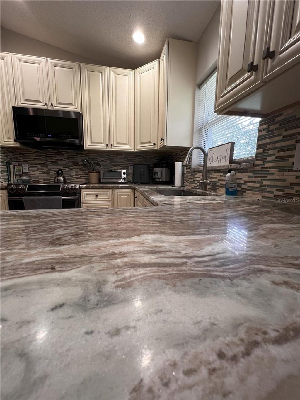 Photo of 28 Beacon Mill Lane, Palm Coast, FL 32137 (MLS # FC313088)