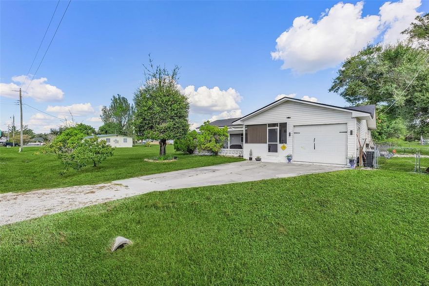 Discover this beautifully updated 3-bedroom, 2-bath home in Punta Gorda, featuring 1,600 sq ft of comfortable living space. Enjoy brand-new flooring, stylish new cabinets, and a refreshed kitchen with new tile and countertops. The inviting living area offers a cozy fireplace, perfect for relaxing evenings. Recent upgrades include a 2024 roof and 2023 HVAC, ensuring peace of mind for years to come. Nestled on a spacious 0.49-acre lot with an attached garage and durable wood frame/CB construction, this property blends modern comfort with Florida charm — ready to welcome you home!