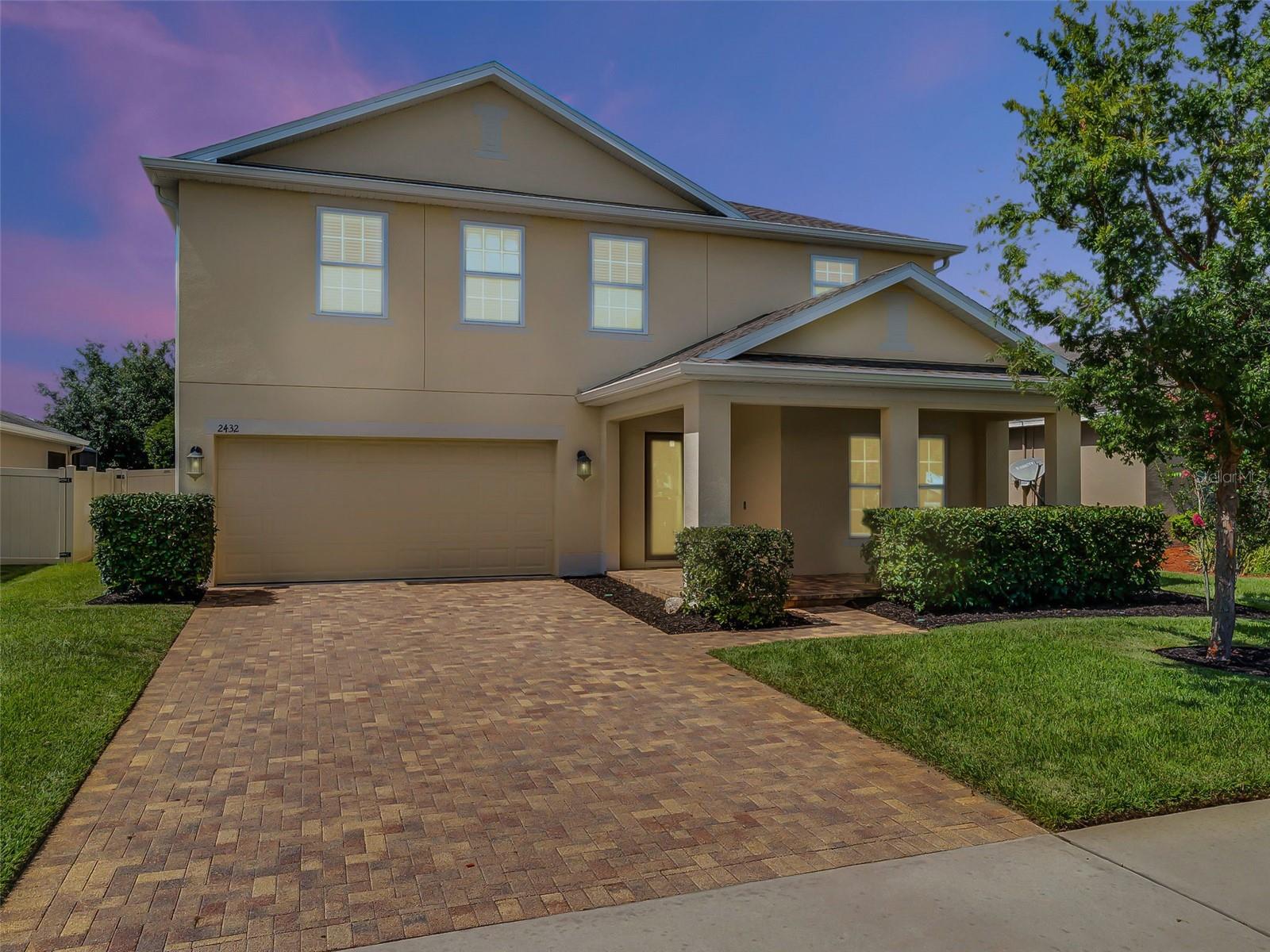 Qualified buyers may receive a 1-year interest rate buydown for the first year paid for by the Seller's preferred lender when financing this home (subject to credit approval and program availability) - call today for details.
This spacious move-in-ready home offers five bedrooms and three full baths, including a bedroom and full bath on the main level, ideal for guests or multi-generational living. Enjoy engineered hardwood flooring throughout with no carpet, offering a clean, timeless look and easy maintenance. A bright open-concept kitchen with gas range and double ovens looks out to views of your screened-in outdoor entertainment area and a fully fenced backyard with lush landscaping and privacy hedges. A spacious loft upstairs provides a second living space or game room, and the upstairs laundry room with built-in sink adds everyday convenience. The oversized primary suite is a retreat, boasting a generous sitting area, two closets, and a luxurious en-suite bath with a walk-in shower and separate soaking tub. Additional upgrades include a whole-house water softener and filtration system, and you’re just one block from the neighborhood pool, ideal for summer fun!