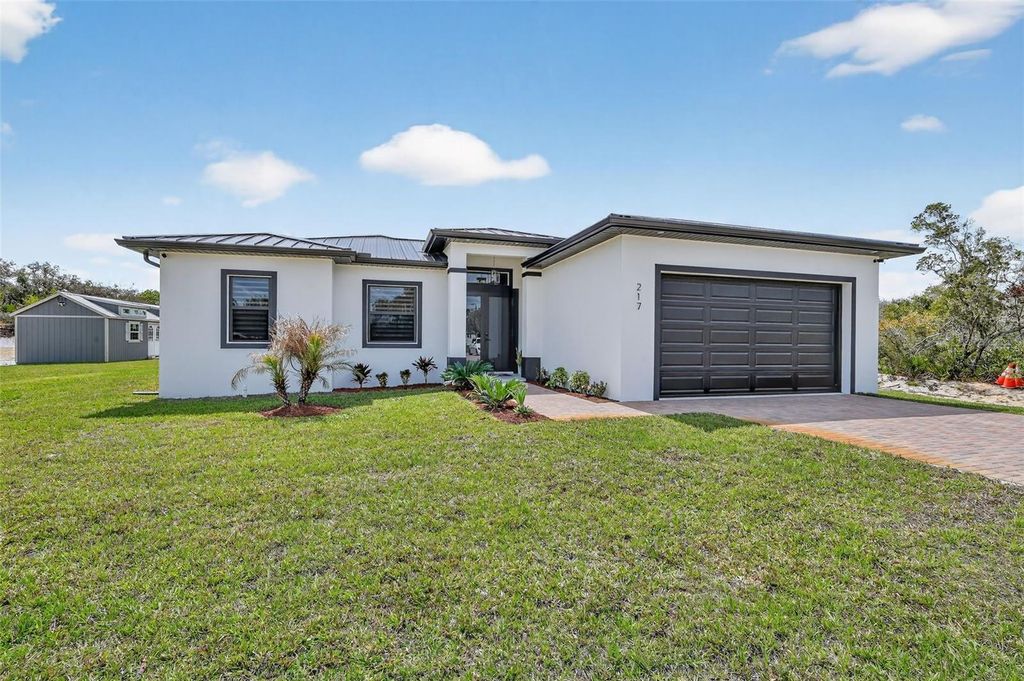 Photo of 217 Cumberland Street, Lake Placid, FL 33852 (MLS # TB8485686)