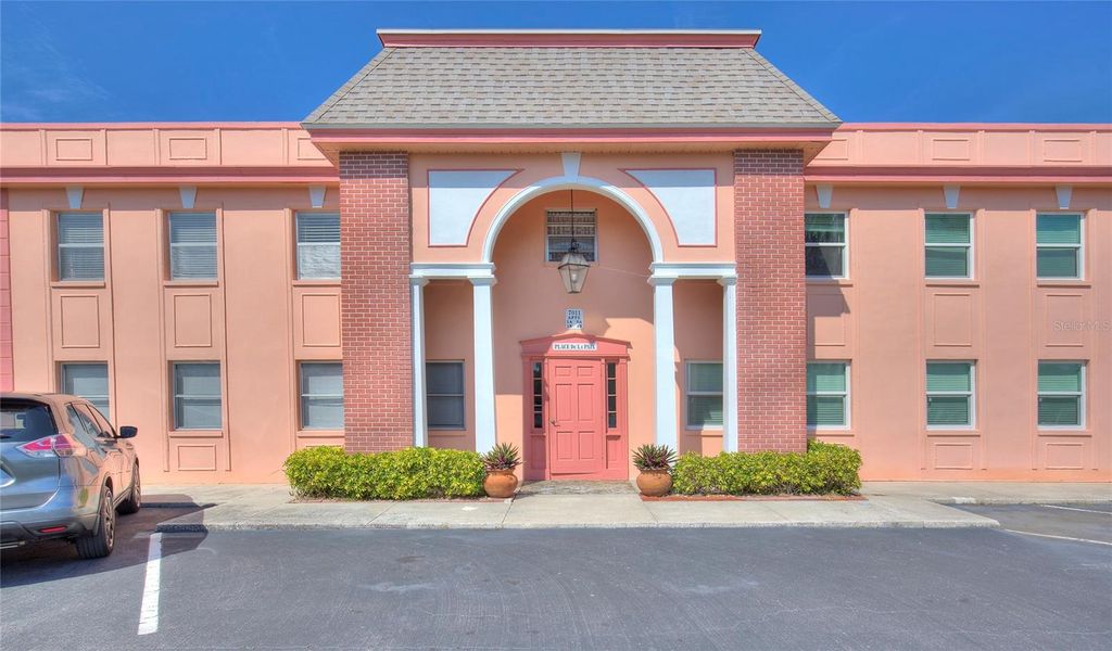 Photo of 7011 Place De La Paix #2A, South Pasadena, FL 33707 (MLS # TB8501278)