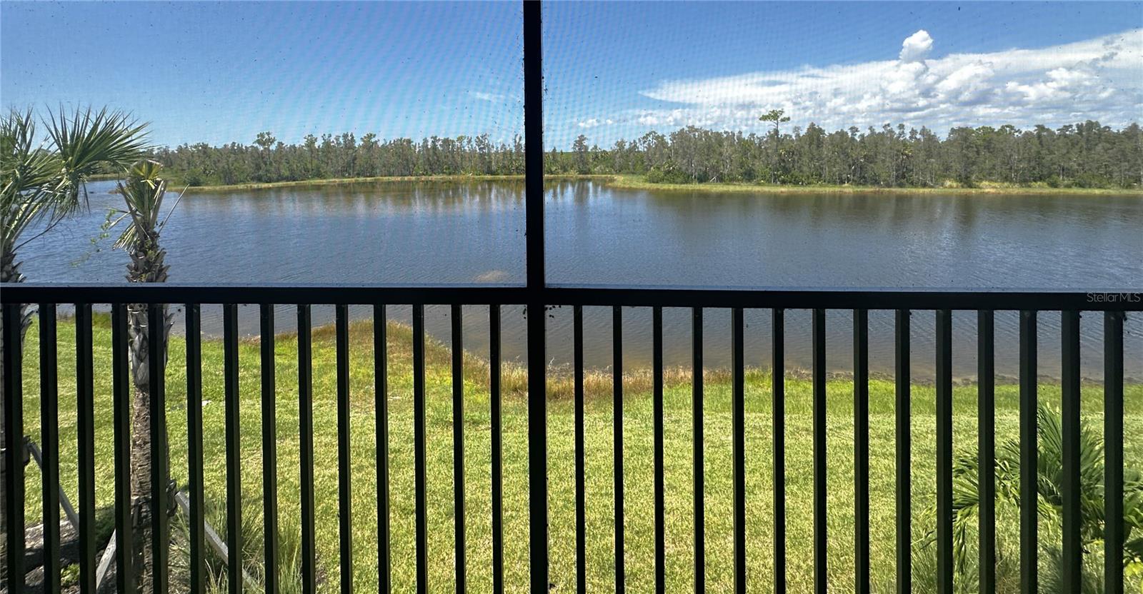 Stunning New Veranda with Social Membership!! Live the Resort Lifestyle at Heritage Landing!! Top floor, END unit, just steps to one of the 4 satellite pools!! Step into luxury with this gorgeous, 2-bedroom plus den, 2-bath veranda, and 1 car garage offering the perfect blend of style, space, and serenity. Designed with both comfort and elegance in mind, this spacious home invites you to enjoy the best of Florida living. Enjoy two private screened-in lanais ideal for morning coffee, evening relaxation, or simply soaking in peaceful sunset lake views, lush greenery, and abundant wildlife. Inside, the home features upscale finishes including white shaker cabinets, quartz countertops, diagonal tile flooring, and stainless-steel appliances. The primary suite offers a tranquil retreat with a double-sink vanity and a spa-like ambiance, perfect for unwinding after a full day of leisure. The community features a guard-gated entry for added peace of mind. Residents can enjoy a resort style pool with dedicated lap lanes, along with 4 satellite pools. For those who love staying active, there are six Har-Tru tennis courts, six pickleball courts, and two bocce courts. The state-of-the-art fitness center and separate aerobics room offer everything you need to maintain a healthy lifestyle. When it’s time to relax, the full-service spa and poolside cafe provide the perfect setting with a full menu and bar service. The new clubhouse also offers additional fine dining/full-service bar with both inside and outside seating. This is more than just a home, it's a lifestyle. Don't miss your opportunity to experience paradise at Heritage Landing. This stunning community offers an amazing location just off Burnt Store Road, offering quick & easy access to Downtown Punta Gorda, Punta Gorda Airport, Fort Myers, Cape Coral & More! (please note there is lanai furniture for both lanais, pictures will be updated soon!)