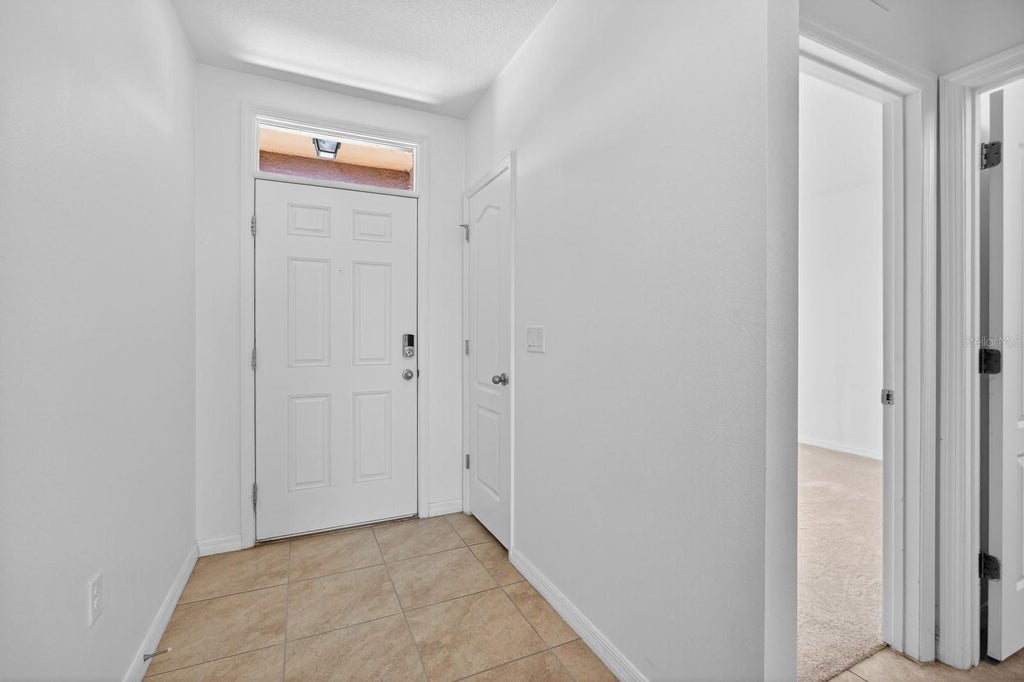 Photo of 445 Panda Place, Davenport, FL 33837 (MLS # O6437934)