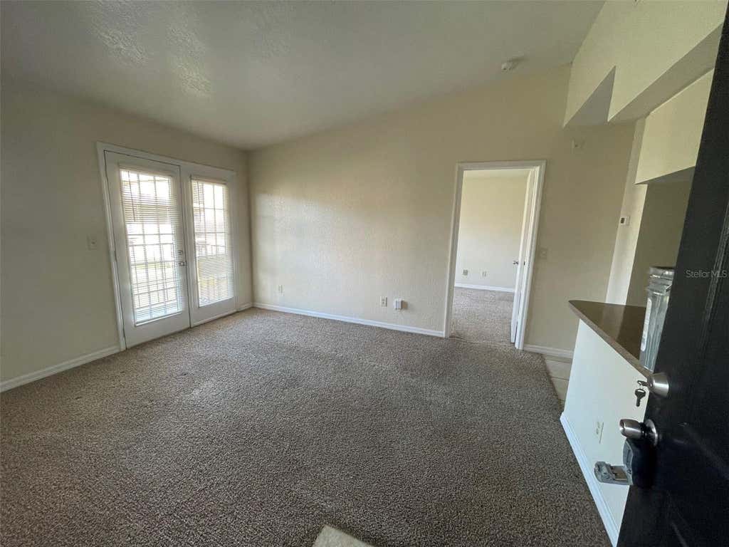 Photo of 2550 N Alafaya Trail #4201, Orlando, FL 32826 (MLS # O6418259)