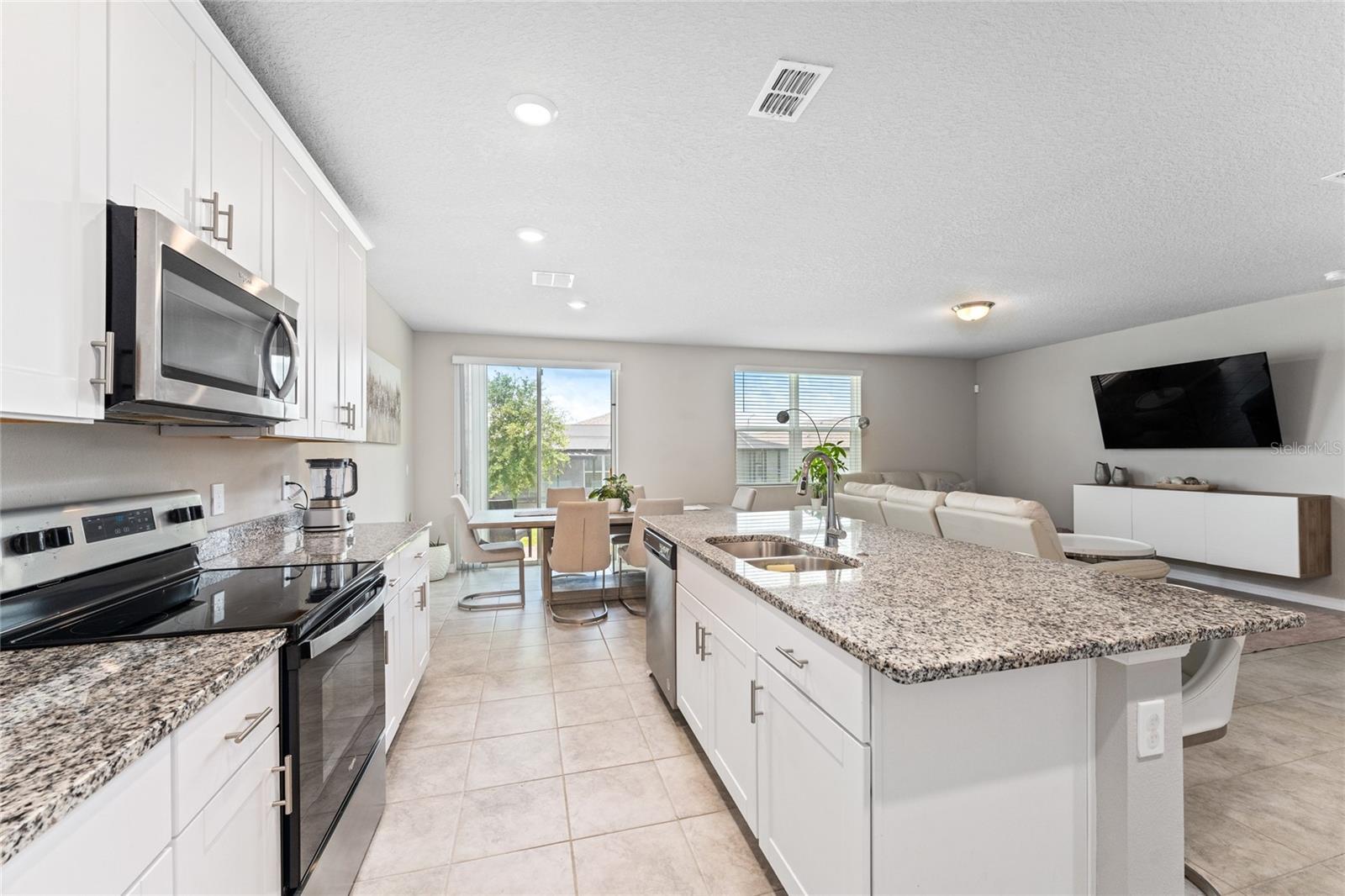 Welcome to comfort location, and lifestyle! Fall in love with this stunning 4-bedroom, 3-bath single family home offering approximately 1,978 sq. ft. of beautifully maintained living space.
Built in 2022 and located just minutes from US-27 in Haines City, this home is ideally positioned only a few miles from Walt Disney World, Legoland, Disney Springs, and other world class entertainment.
From the moment you walk in, you’ll be impressed by the spacious family room, perfect for everyday comfort or entertaining guests. The open-concept kitchen features elegant granite countertops, while the bright dining and living areas offer a welcoming flow.
This move-in-ready home is located in a small, friendly neighborhood that blends charm and practicality. You’ll love the added value of solar panels, helping you save on your electric bills every month. The community also features a playground, dog park, and swimming pool, offering great amenities for families and guests alike.
Centrally located just 1.7 miles from grocery stores, 3.1 miles from local schools, and close to major attractions, this property offers both an exceptional lifestyle and investment potential. Whether you’re looking for a primary residence or a seasonal getaway, this home also makes a smart choice for those seeking strong rental income in Central Florida’s thriving real estate market.
Schedule your private showing today and discover everything this exceptional home has to offer!
