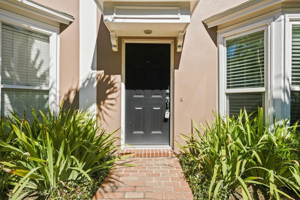 Photo of 301 S Bungalow Park Avenue #C, Tampa, FL 33609 (MLS # A4686796)