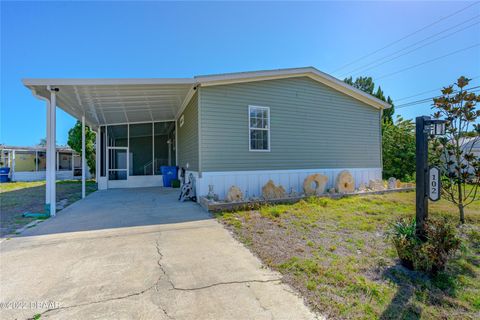 Photo of 102 Ash Street, Edgewater, FL 32141 (MLS # O6401336)