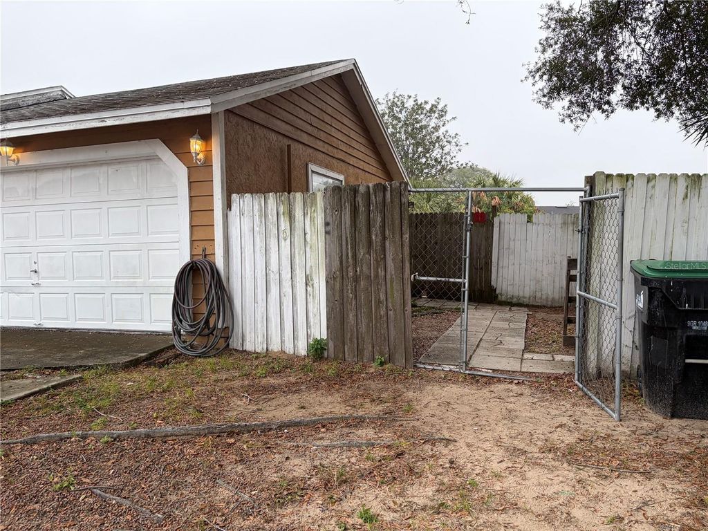 Photo of 1311 Woodman Way, Orlando, FL 32818 (MLS # S5140719)