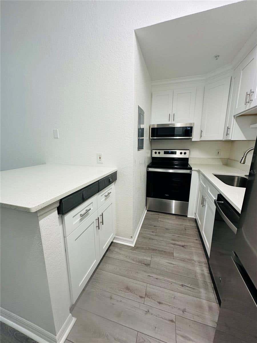 Photo of 6328 Raleigh Street #816, Orlando, FL 32835 (MLS # O6427180)