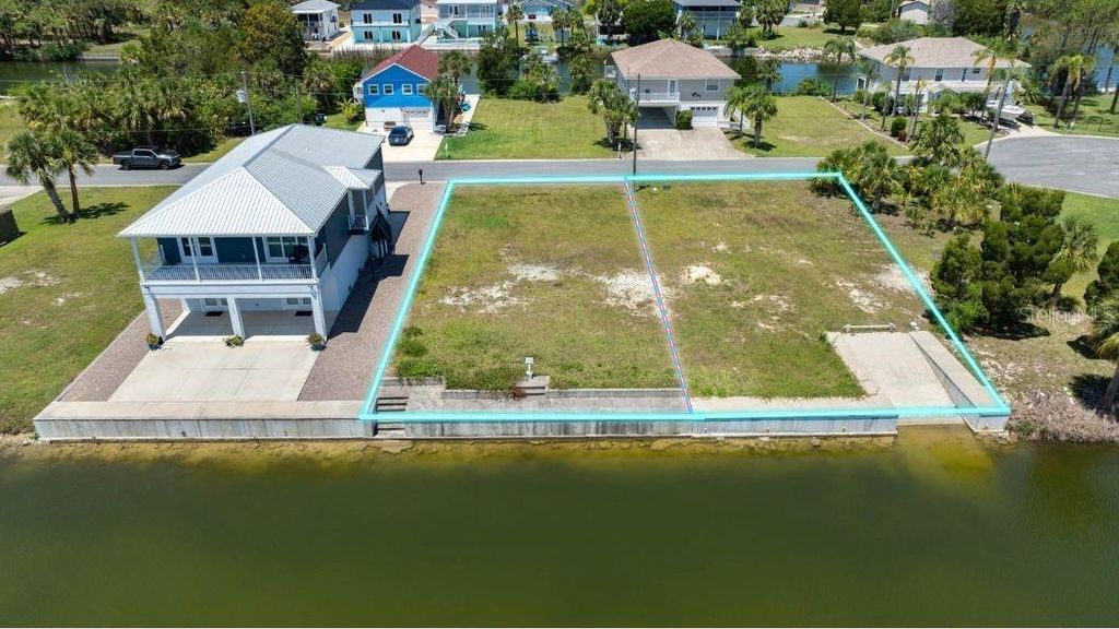 Photo of 3398 Fernleaf Drive, Hernando Beach, FL 34607 (MLS # TB8386214)