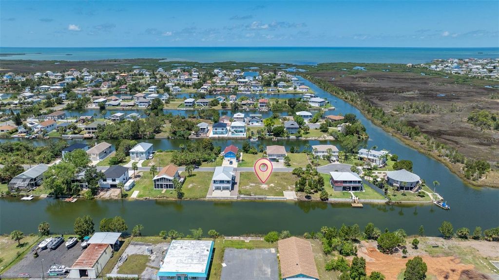 Photo of 3398 Fernleaf Drive, Hernando Beach, FL 34607 (MLS # TB8386214)