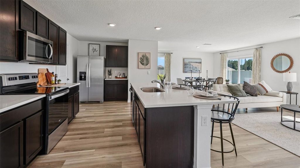 Photo of 3106 Evenmore Way, Wildwood, FL 34785 (MLS # OM717313)