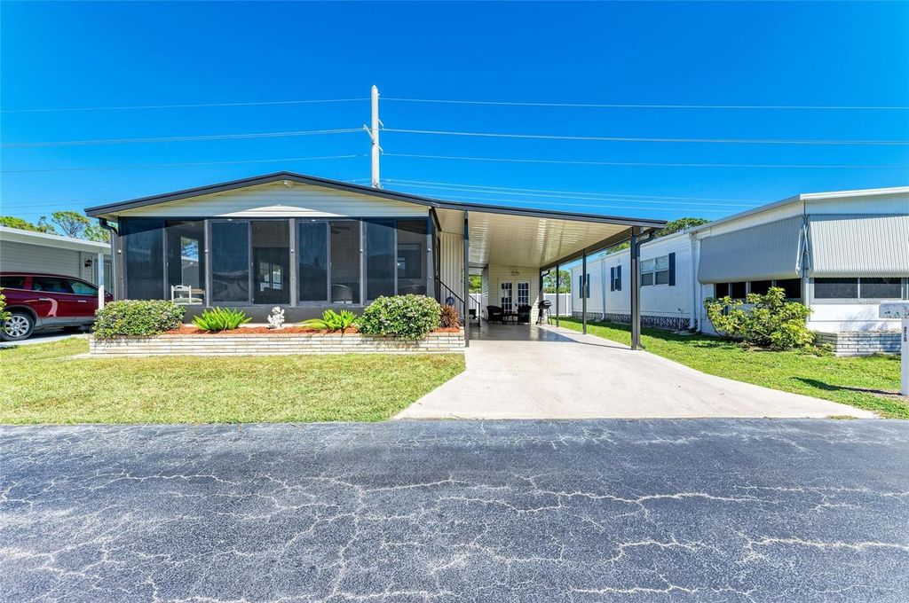 Photo of 216 Palm Air Drive, Osprey, FL 34229 (MLS # A4672438)