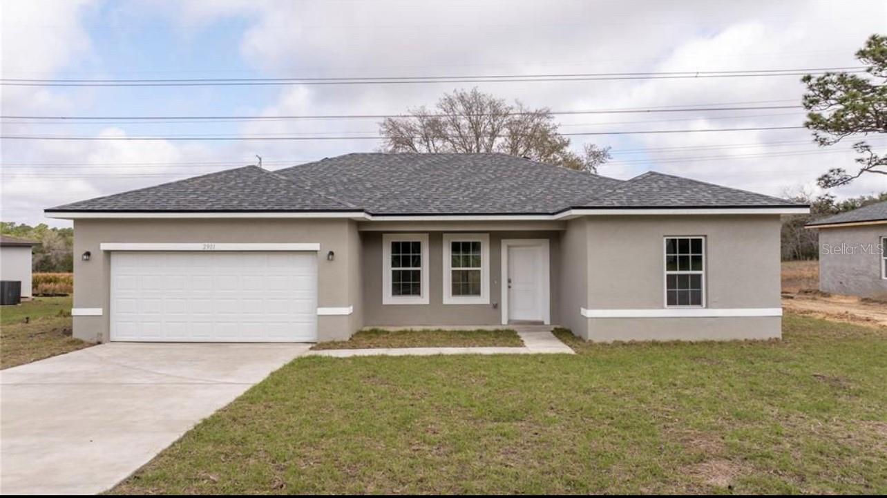 Spacious 4-bedroom, 2-bath home with a 2-car garage. Bright open floor plan, modern kitchen, and plenty of storage. Quiet neighborhood in Citrus Springs.
