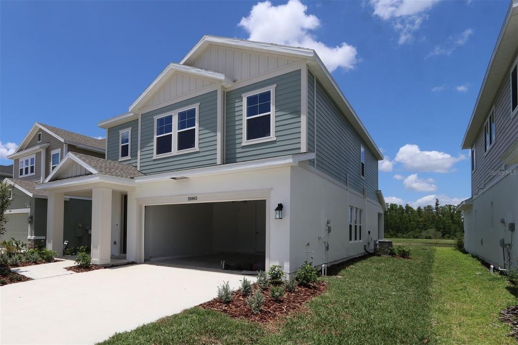 Photo of 28965 Orange Berry Drive, Wesley Chapel, FL 33543 (MLS # TB8346099)