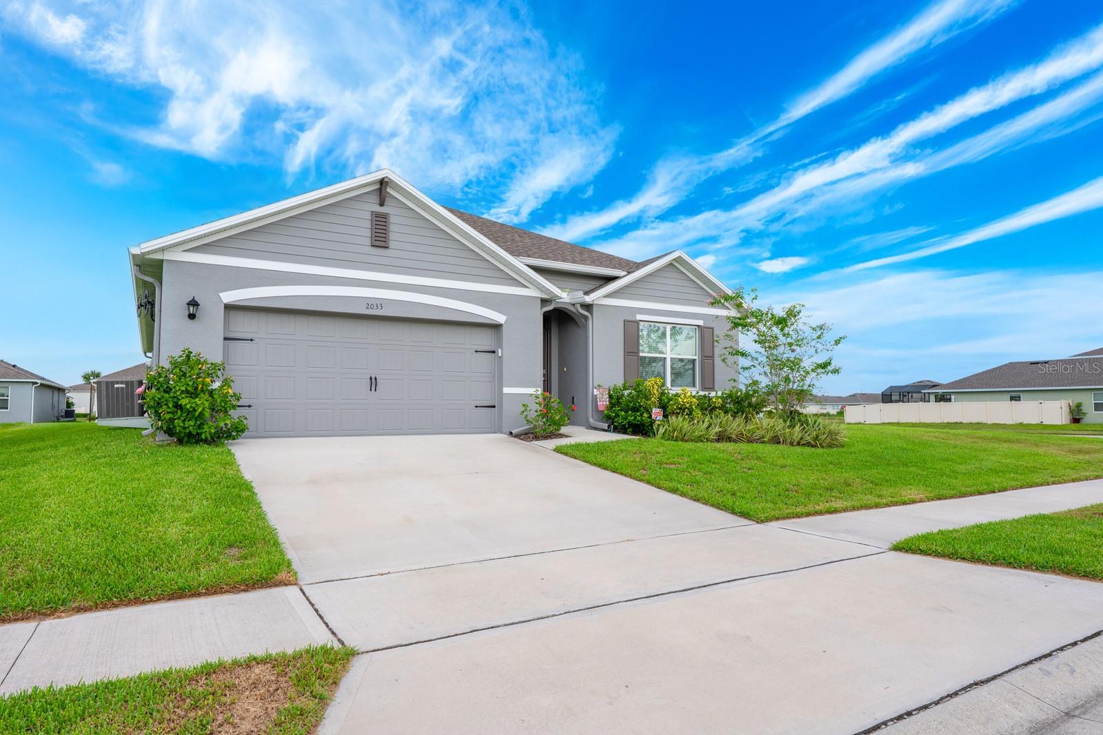 **This property QUALIFIES FOR A CREDIT UP TO $6675 through the seller's preferred lender**Welcome to this immaculately maintained, MOVE-IN READY GEM in Riverbend at Cameron Heights in Sanford! Built in 2022, this 4-bedroom, 2-bathroom single-story home offers over 1,800 square feet of thoughtfully designed living space—all still feeling LIKE NEW. Recent updates include FRESH EXTERIOR PAINT (2024), an OVERHEAD GARAGE STORAGE RACK (2023), and a 50-AMP GENERATOR INLET (2023), plus peace of mind with an active termite bond and 7 years remaining on the builder’s structural and A/C warranty. Designed for efficiency, this home has consistently kept electric costs under $100/month. Sitting on a desirable CORNER LOT, you’ll enjoy extra yard space and a location directly across from the COMMUNITY POOL and playground. Inside, the OPEN FLOOR PLAN places the Kitchen at the heart of the home, featuring an OVERSIZED ISLAND, stone countertops, modern cabinetry, and quality MODERN APPLIANCES—a perfect setup for gatherings and everyday living. The connected Dining and Living areas create a spacious, welcoming environment, ideal for entertaining or relaxing. The SPLIT BEDROOM LAYOUT provides privacy, with the primary suite offering an en suite bath complete with a large WALK-IN CLOSET, dual sinks, a separate water closet, and a walk-in shower. Three additional bedrooms and a second full bath ensure space for family, guests, or a home office. Step outside to a covered rear patio overlooking a LARGE BACKYARD, perfect for outdoor dining, play, or future enhancements. Residents of Riverbend at Cameron Heights enjoy a community pool, playgrounds, and scenic green spaces. You're also minutes from DOWNTOWN SANFORD and the Riverwalk, and just a short drive to the Publix at Lake Forest Shopping Center for groceries and daily essentials. With EASY ACCESS to SR-417 and area highways, and just 5 miles from SANFORD INTERNATIONAL AIRPORT, this location offers both convenience and charm. With its LIKE-NEW condition, ENERGY EFFICIENCY, and unbeatable location—this home is ready for you to make it yours. Schedule your private showing TODAY!