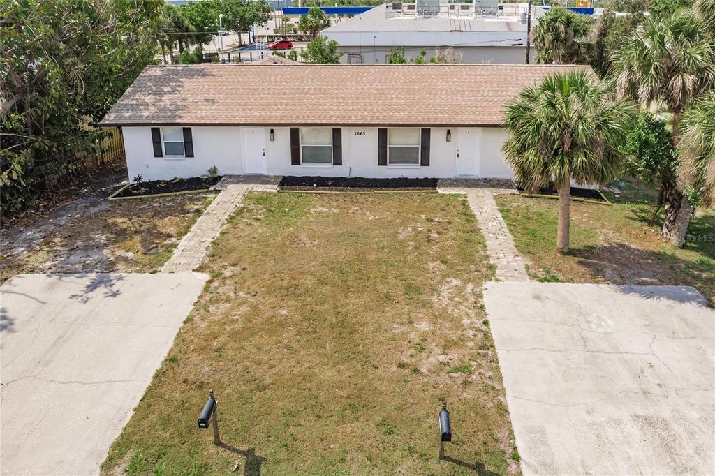 Photo of 1665 Florence Avenue, Englewood, FL 34223 (MLS # C7508869)