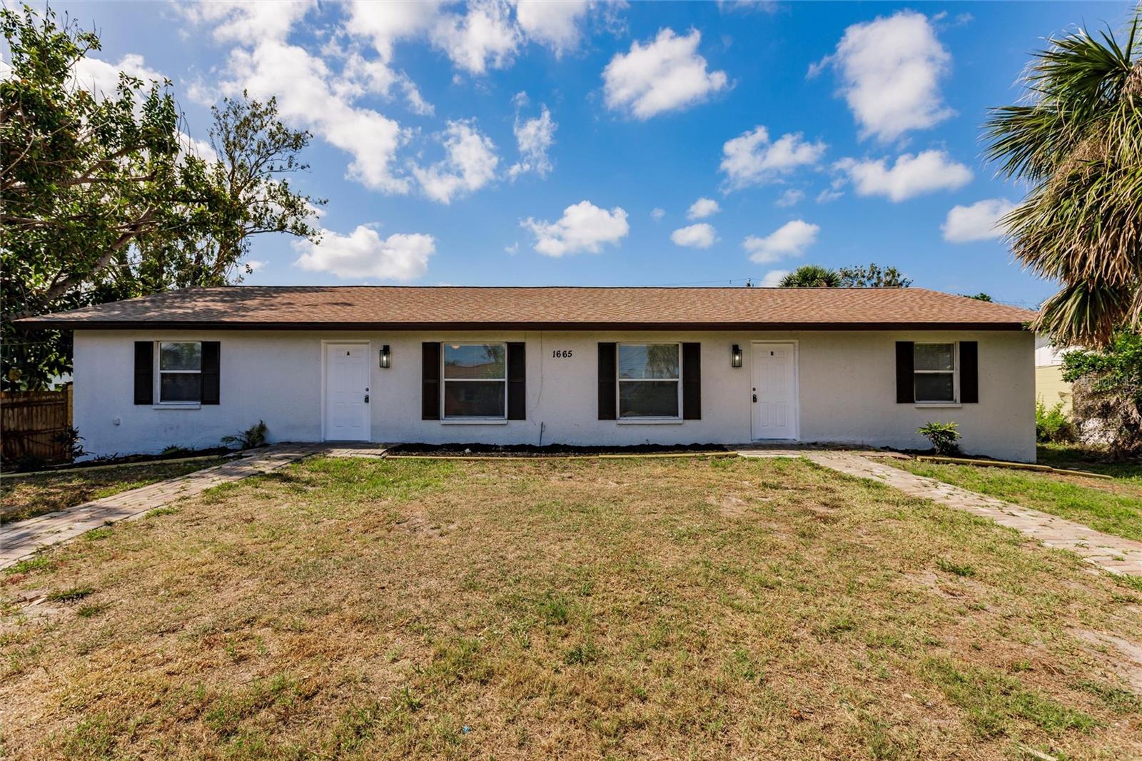 Don’t miss this incredible Investment Opportunity! This centrally located duplex offers two well-maintained units just under 3 miles from beautiful beaches, popular restaurants, shopping, and top-rated golf courses. New Roof since 2023
One side features a spacious 3-bedroom, 2-bath layout, while the other offers a comfortable 2-bedroom, 2-bath floor plan—ideal for generating rental income or multi-generational living. Both units include indoor laundry for added convenience, durable tile flooring throughout, and private back porches perfect for relaxing or entertaining.
Driveway parking provides off-street convenience, and the location can’t be beat—close to everything the area has to offer. Whether you’re looking to live in one side and rent the other, or add to your rental portfolio, this duplex is a smart move with strong income potential.