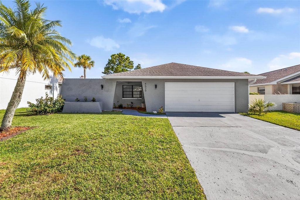 Photo of 4529 Dewey Drive, New Port Richey, FL 34652 (MLS # TB8416201)