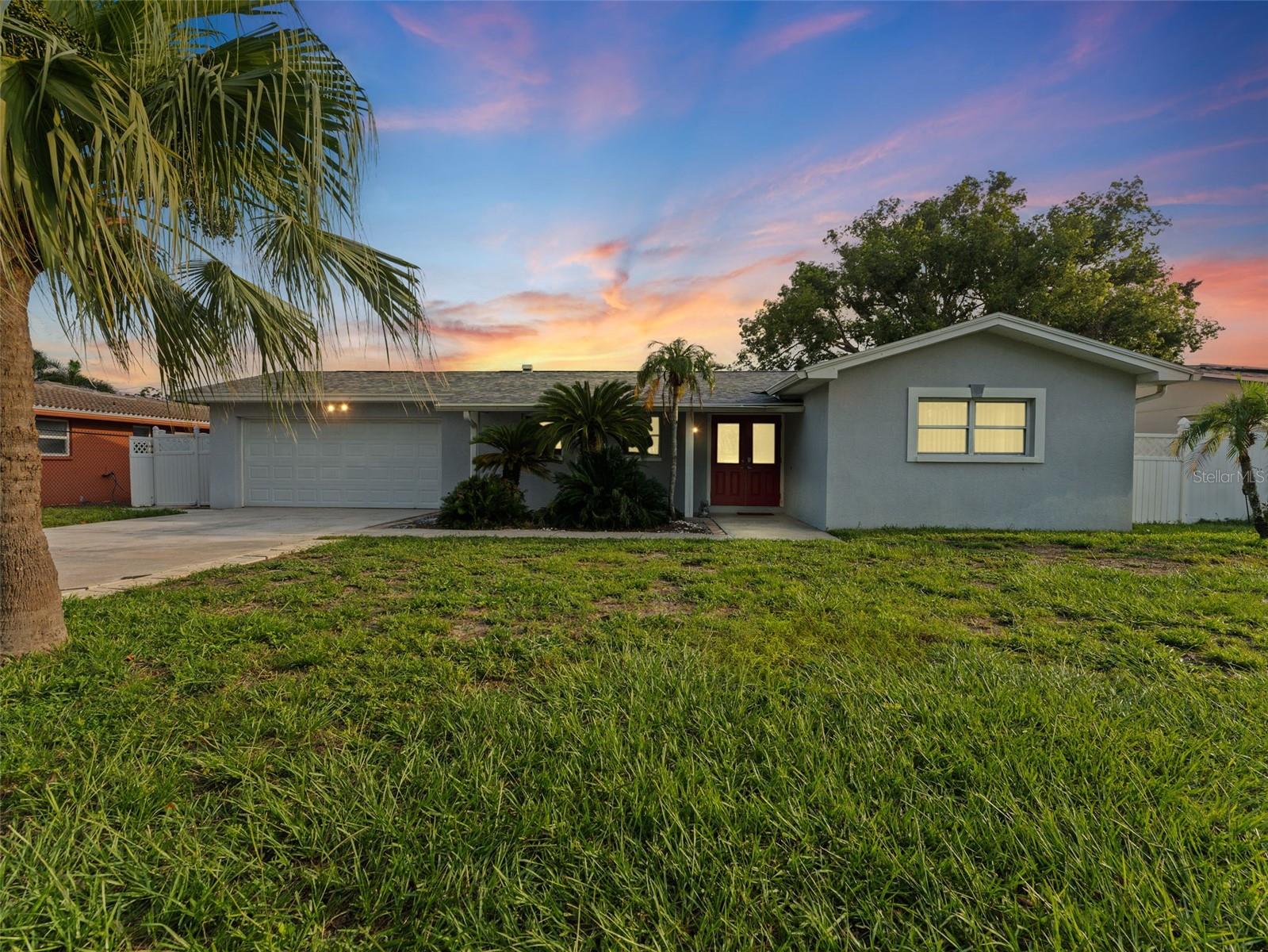 This beautifully maintained 4-bedroom, 3-bath, 2-car garage pool home offers over 2,400 sq. ft. of comfortable living in a highly sought-after Seminole school district. The split floor plan features two generous primary suites, each providing privacy and luxury—one overlooking the pool and the other with direct backyard access, dual walk-in closets, and a spa-inspired bath. The additional bedrooms share a thoughtfully updated bath, while the kitchen showcases granite countertops and modern appliances, seamlessly connecting to the formal dining room and great room with a granite bar—perfect for entertaining. Step outside to your fully fenced backyard oasis, complete with a sparkling pool, pergola, and covered pavilion, ideal for relaxing or hosting gatherings. Recent updates include fresh interior paint and new flooring in select bedrooms. Located just minutes from Gulf beaches, Pinellas Trail, Walsingham Park, and shopping, this home blends style, comfort, and convenience in one of Seminole’s most desirable neighborhoods. Schedule your private showing today!