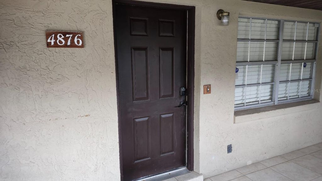 Photo of 4876 Lake Ridge Road #5, Orlando, FL 32808 (MLS # R4910726)